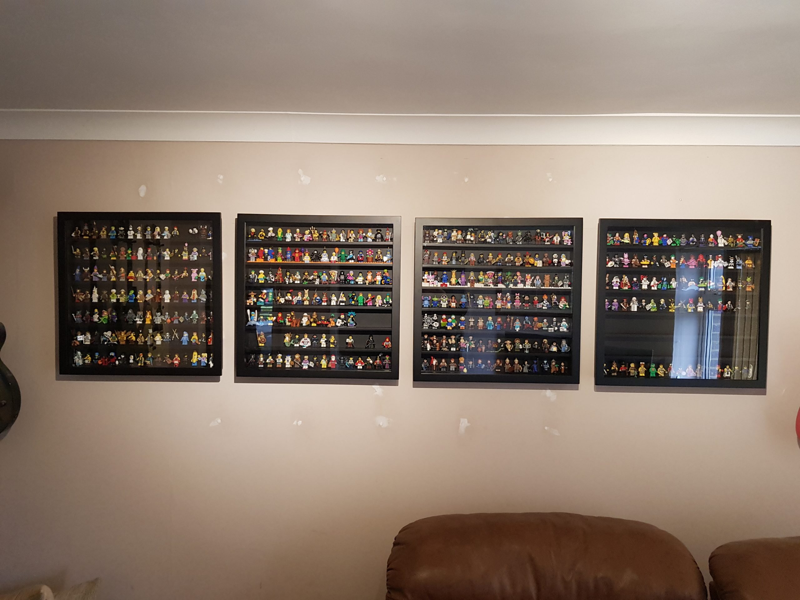 White frame packed with DC and Marvel superheroes